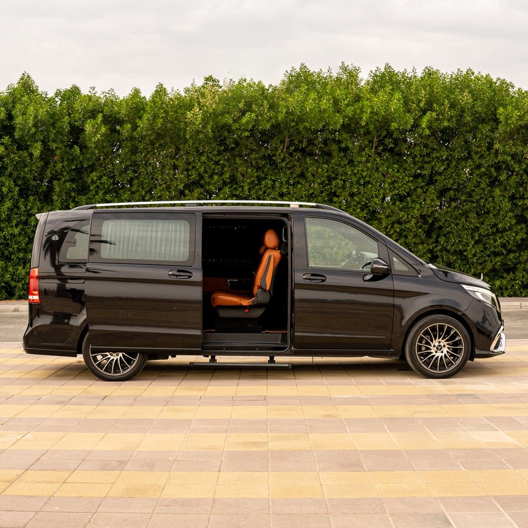 Side view of chauffeur-driven Maybach Falcon Edition van