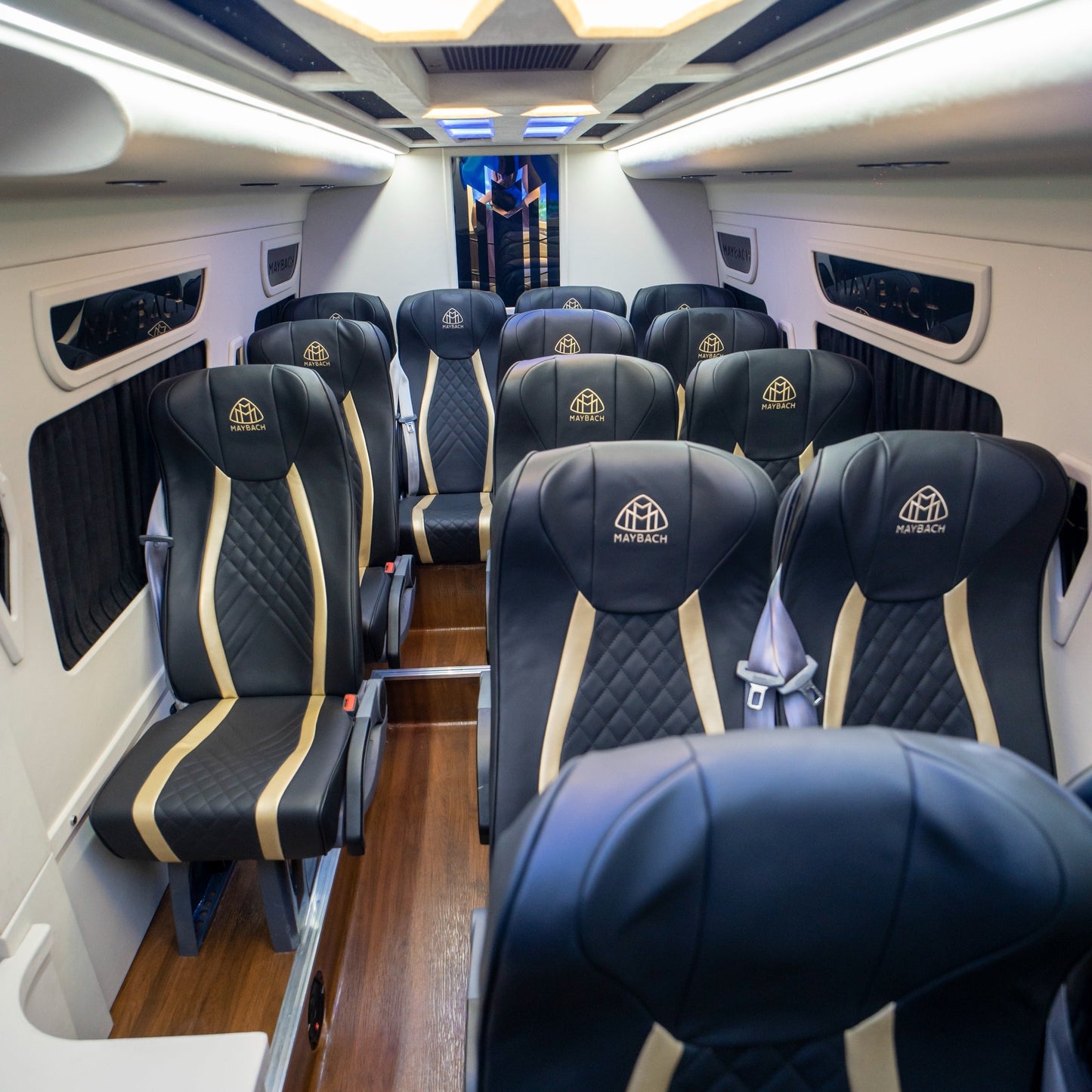 Reclining leather seats inside Maybach Sprinter 14-seater van