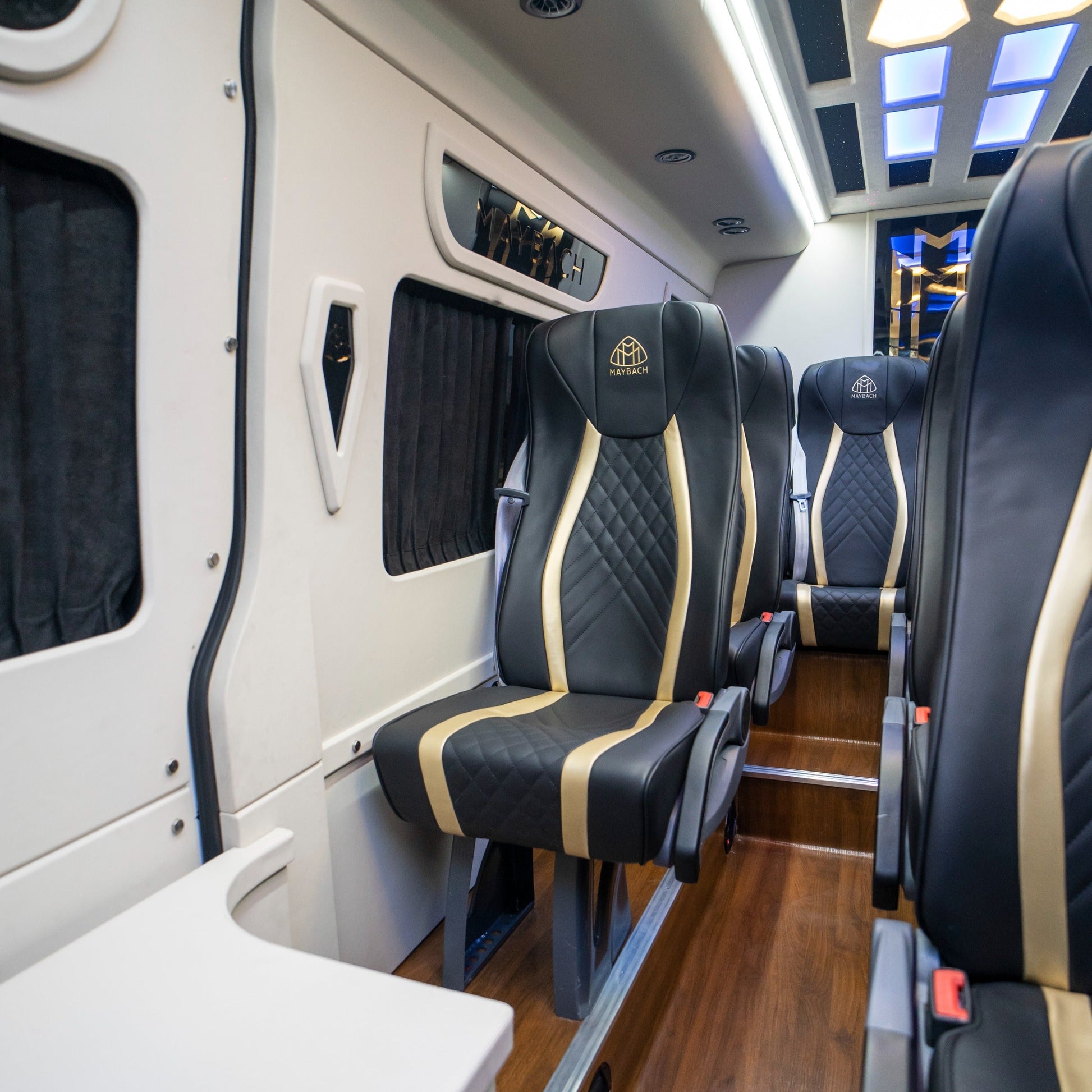Spacious Maybach-style interior of 14-seater chauffeur van