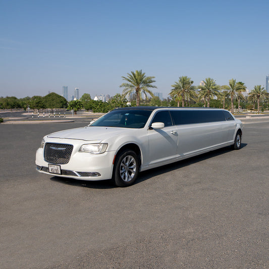 Chrysler White stretch limousine with chauffeur in Dubai
