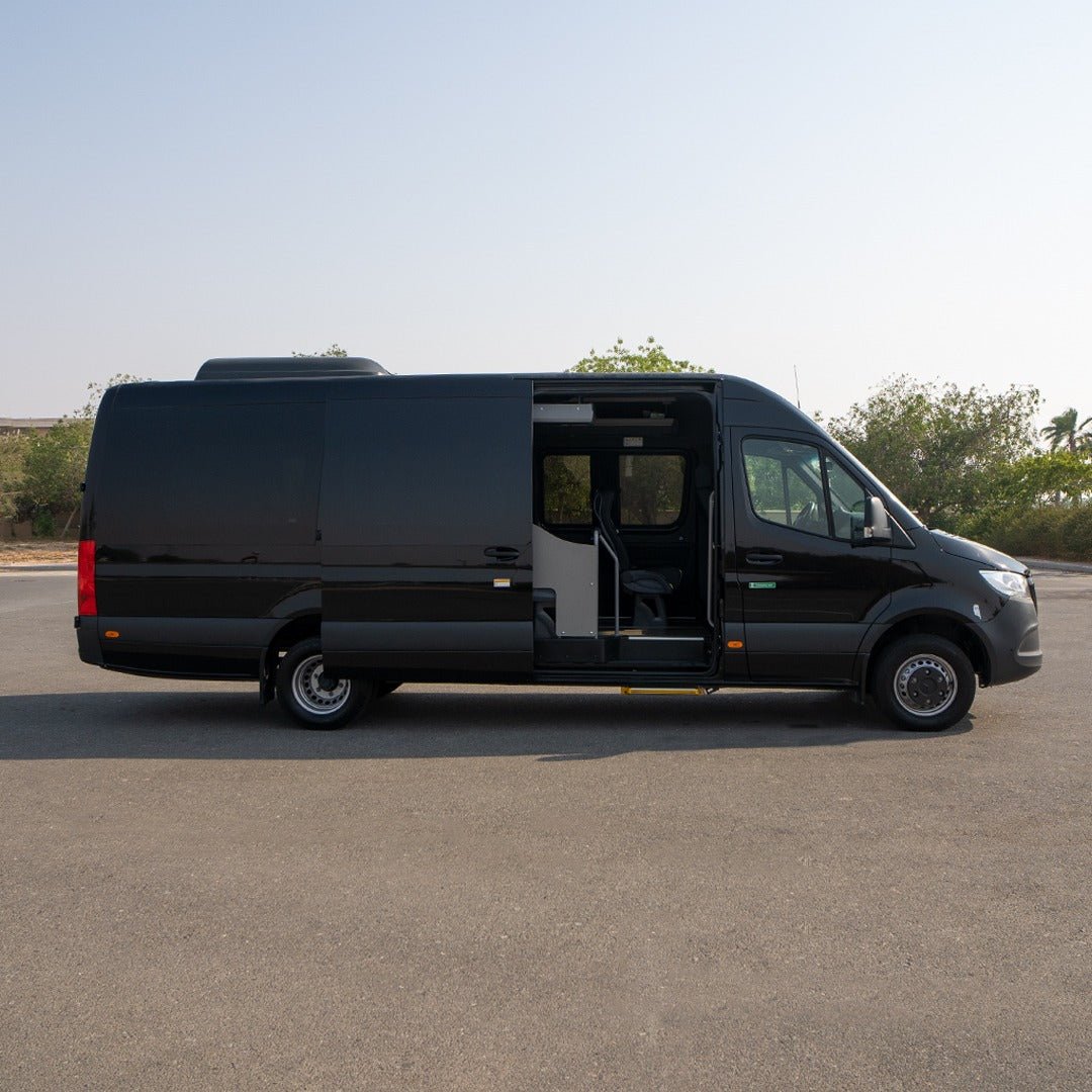 Door opening shot of Mercedes Elite Sprinter 19 seater van 