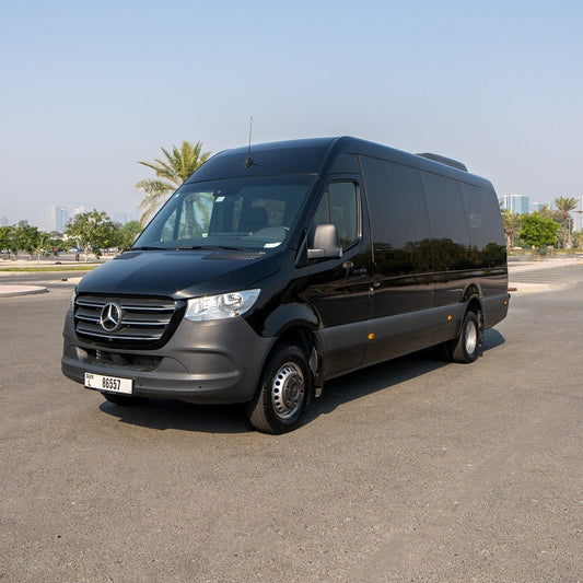 Front view of Elite Sprinter 19-seater Mercedes van in Dubai
