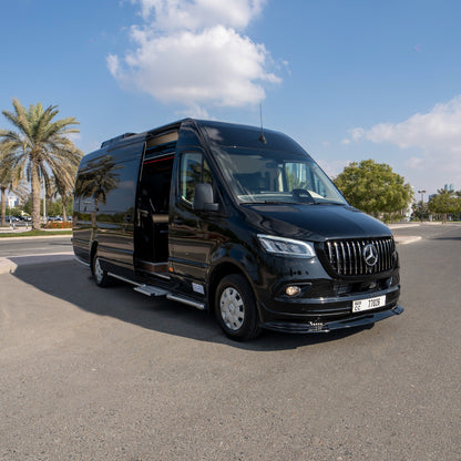 Door opening view of Maybach Sprinter 19-seater luxury van in Dubai