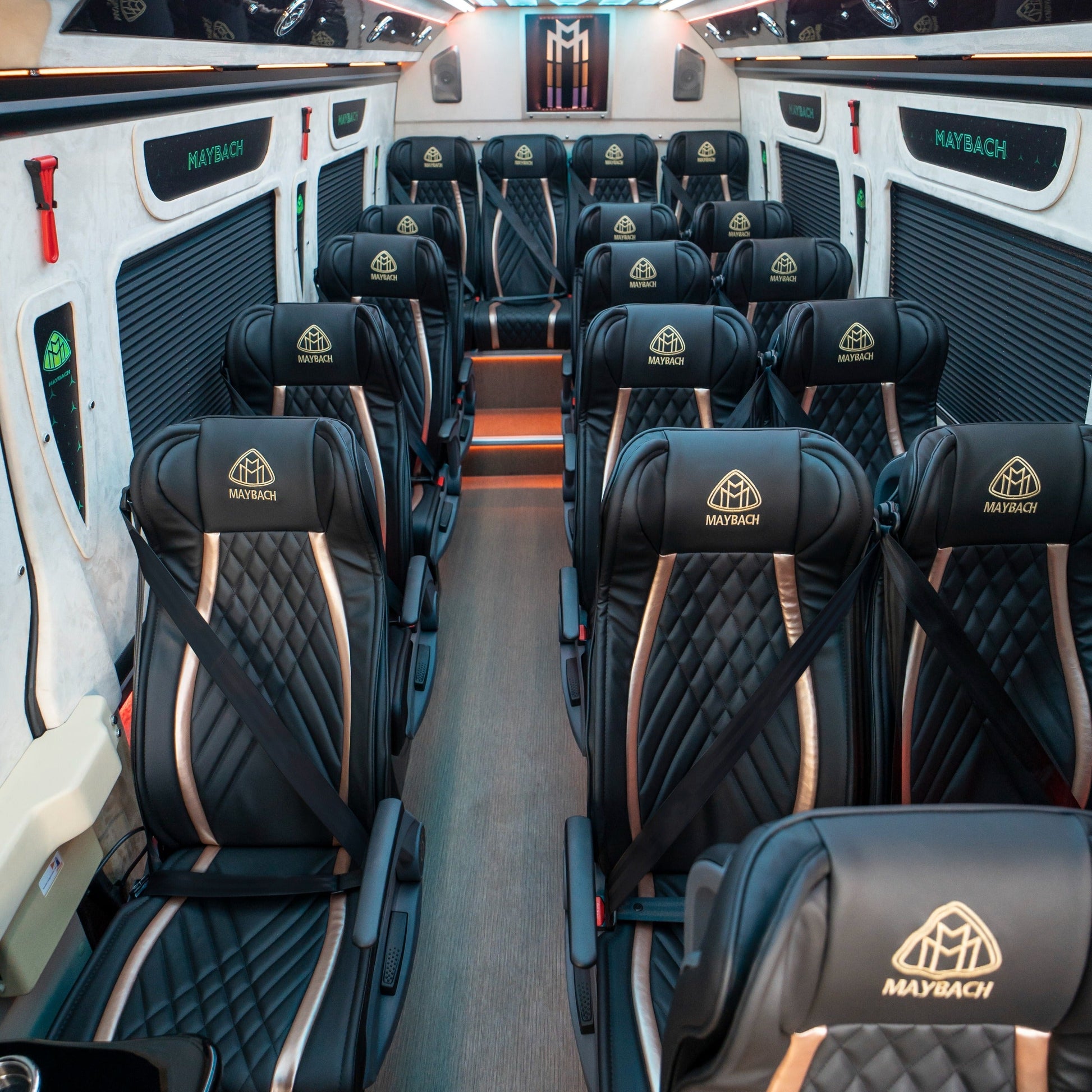 Luxury leather reclining seats inside Maybach Sprinter 19-seater van