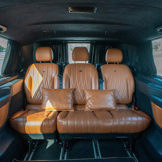 Captain seats inside V-Class Imperial with luxury trim and ambient lighting