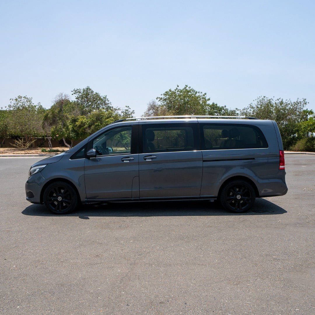 Chauffeur-driven Vito Executive parked outside luxury hotel