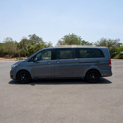 Chauffeur-driven Vito Executive parked outside luxury hotel